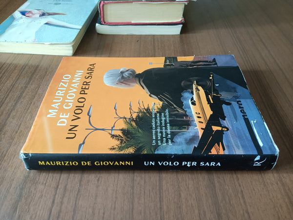 Un volo per Sara | Maurizio De Giovanni - Rizzoli